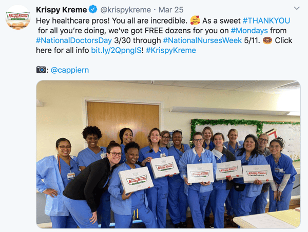 Tweet screenshot from Krispy Kreme, healthcare workers holding Krispy Kreme doughnut boxes 