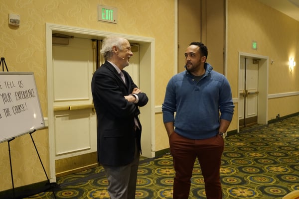 fred zar speaking with a course attendee 